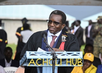 The Chief guest the State Minister Northern Uganda Kenneth Omona giving his speech during the graduation for second and third intake 2023 of the Acholi Sub-region Presidential Industrial Hub in Oding Village, Onyama sub- county in Gulu CIty on the 19th April 2024. Photo by PPU/Tony Rujuta.