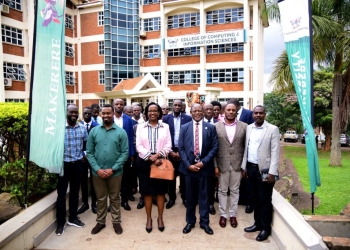 Mrs. Lorna Magara (3rd Left), Prof. Barnabas Nawangwe (3rd Right), Ms. Samuel Mugabi (2nd Right), Mr. Amon Muteganda (Right) and other officials pose for a group photo after the official launch of the Attendance Management System on 3rd May 2024.
