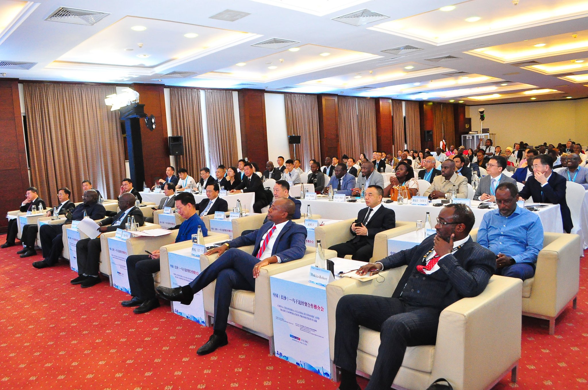 Hon. Mwesigwa Rukaari, MP for Mbarara City North and Chairman of the National Resistance Movement (NRM) Entrepreneurs League, addresses the audience during the China-Uganda Economic and Trade Cooperation Fair in Kampala. He emphasized the importance of strengthening economic ties between China and Uganda, highlighting opportunities for trade and investment in areas such as agriculture, tourism, and infrastructure development