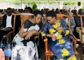 Minister of Health Dr. Ruth Aceng and Permanent Secretary Dr. Diana Atwiine pay their respects at the burial of Dr. Joshua Musinguzi, a champion in the fight against HIV/AIDS in Uganda. Their presence honors his legacy and dedication to improving healthcare in Uganda.