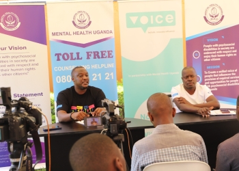 Mr. Derrick Kiiza Mbuga, Executive Director Mental Health Uganda (MHU) addressing journalists in Kampala
