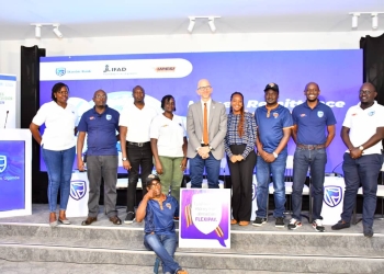 FlexiPay, IFAD and Upesi Money Transfer Teams pose for a group photo after the launch at Amin Pasha Hotel in Kampala..JPG