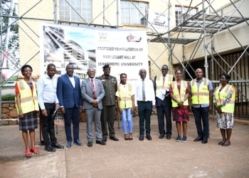 Prof. Barnabas Nawangwe (3rd Left) and Lt. Gen. James Mugira (4th Left) pose for a group photo with Left to Right: Ms. Ritah Namisango, Eng. Brian Buhanda, Mr. Yusuf Kiranda, Ms. Mary Gloria Nakajubi, Prof. Henry Alinaitwe, Eng. Okuk Geoffrey Bright Owera, Mrs. Winifred Kabumbuli, Mr. Rodney Rugyema and Ms. Norah Nalubowa.