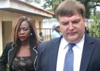 Mr David Greenhalgh and city socialite Shanita Namuyimbwa, aka Bad Black, arrive at the Anti-Corruption Court in Kampala in 2012. A UK court has charged Mr Greenhalgh with 12 counts of breaching arms embargoes for allegedly supplying arms to several countries. Photo/File