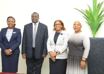 L-R Chief Registrar Sarah Langa Siu , Chief Justice Aliphonse Owiny Dollo and the the elevated officers at Judiciary Headquarters after taking oath of allegiance. (Photo by Judiciary)