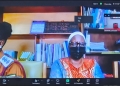 Molly Katanga, on trial over the death of her husband Henry Katanga, appears in court via video link