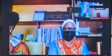Molly Katanga, on trial over the death of her husband Henry Katanga, appears in court via video link