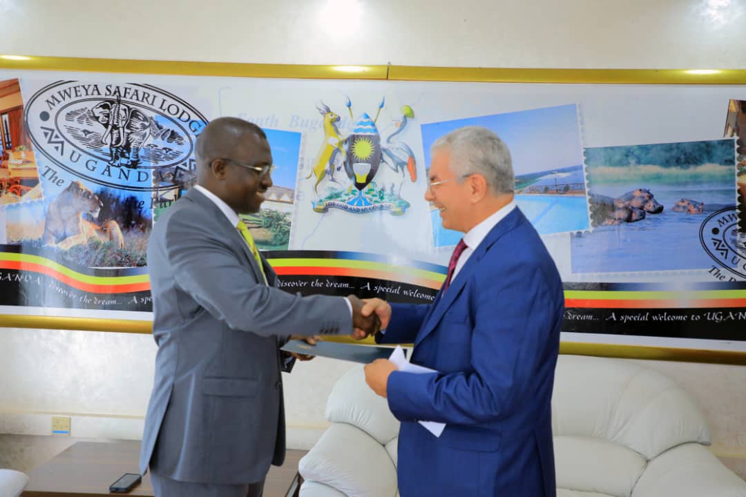 Mourad Amokrane, Ambassador-Designate of Algeria to Uganda, presents his Letters of Credence to John Mulimba, Minister of State for Foreign Affairs, at a ceremony held at the Ministry of Foreign Affairs in Kampala, Uganda. The presentation of credentials marks the official beginning of Amokrane's tenure in Uganda and strengthens the diplomatic ties between the two nations.