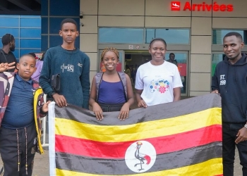 The team members are Shanice Asante Baluka from Heritage International School, Roshan Aitham Karoobi from The Stoneridge School, and Donald Intwari Buchanan from Aga Khan International School. They are accompanied by their coaches, Monica Arinaitwe and Anatori Tucungwire.