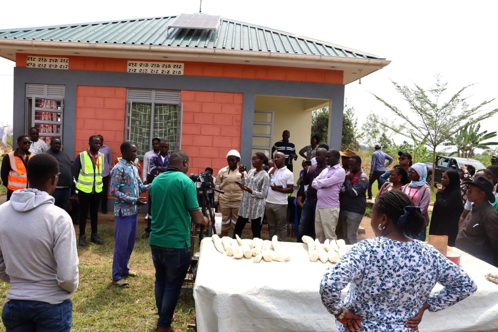 The Team visits the home of the resettled beneficiary engaged in adding value to cassava.