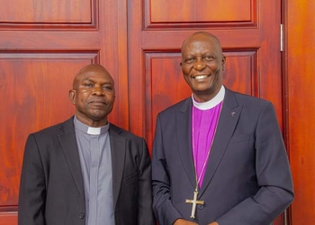 Rev Canon Baalwa right with a colleague  (courtesy photo)
