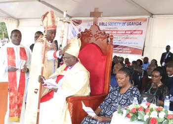 Rt Rev Michael Chorey being conservated by Rt Rev Stephen Kaziimba Mugalu