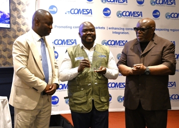 From left to right: Dr Willard Mwemba, the chief executive officer of the COMESA competition Commission; Samuel Sanya and Dr George Lipimile, the first previous Chief Executive Officer of the CCC