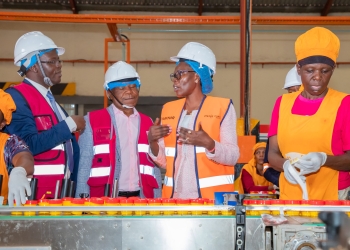 Minister Evelyn Anite touring Movit production process (PHOTO/File)