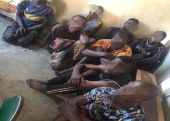 SUSPECTS NABBED: Some of the 8 suspected criminals arrested by Katwe Division Police in Kampala Metropolitan South for their alleged involvement in robbery and theft. The suspects, who were found with stolen goods including TVs, fridges, and mattresses, are currently in custody facing charges.