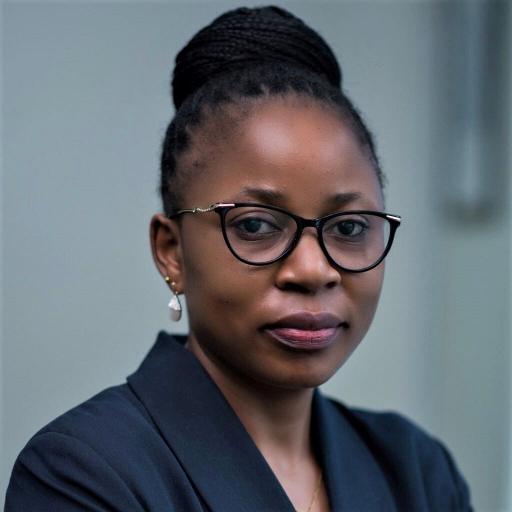 Hellen Masika, Community Mobilizer at CECIC, empowering communities for environmental conservation.