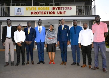 Youth leaders pose with Col. Nakalema after a productive meeting to discuss innovative solutions for Uganda's economic growth and development.