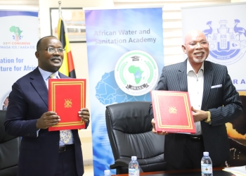 Foreign Affairs Minister Gen Abubakar Jeje Odongo and AfWASA President Eng. Dr. Silver Mugisha