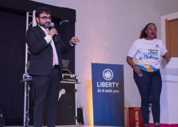 Mr. Danish Mohammad Eqbal, Principal Officer/CEO of Liberty Life explaining to the students the Liberty Kuza School Challenge with the Head of Marketing at Liberty Life Mrs. Juliet Murungi Okwi