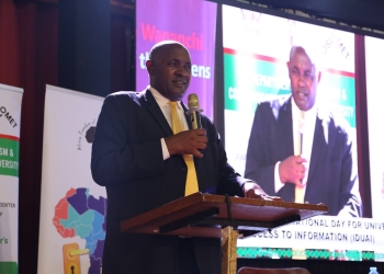 Dr. Chris Baryomunsi, Minister for ICT and National Guidance, emphasizes importance of access to information during International Day for Universal Access to Information (IDUAI) celebrations at Makerere University