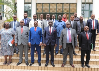 Minister John Mulimba (center) with diplomats from Nile Basin countries following a briefing on Uganda's hosting of the Second Nile River Basin Summit