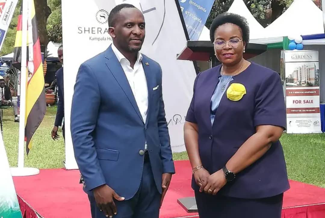 Edwin Musiime, Chairman of Olim Group, and Lands and Housing Minister Persis Namuganza (PHOTO/UG Standard)