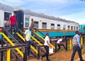 Passengers disembark from Uganda Railways Corporation locomotives at Kampala's main railway station, as the country revamps its rail network