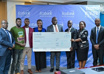 #EcobankUGExtramile Challenge Winners Receive Awards from Ecobank Uganda's Senior Management. (L-R) Robert Jjagwe, Patrick Mayanja, Belinda Ssemwanga, Fred Mukasa, and Julius Ssekabira honor outstanding community organizations.