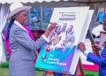 Uganda's Education Minister, Janet Kataaha Museveni, leaves her mark on a symbolic book during the historic launch of the Emerging Leaders Program at Makerere University on Friday, September 27, 2024.