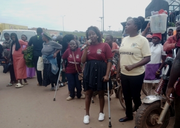 A team from SHAU and partners conducting an awareness program at Kalerwe market on Thursday.