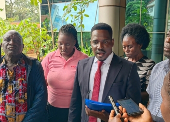 L-R Widower, Mr. Steven Nsereko, Namale Desire and Counsel , Mr. Titus Asiimwe addressing press at High Court Tweed towers on Tuesday.