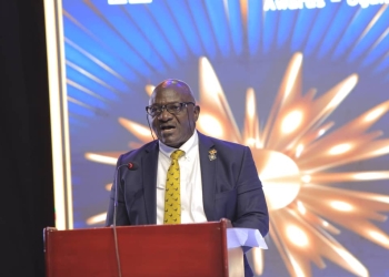 General Katumba Wamala addressing the gathering at Serena Hotel on Wednesday.