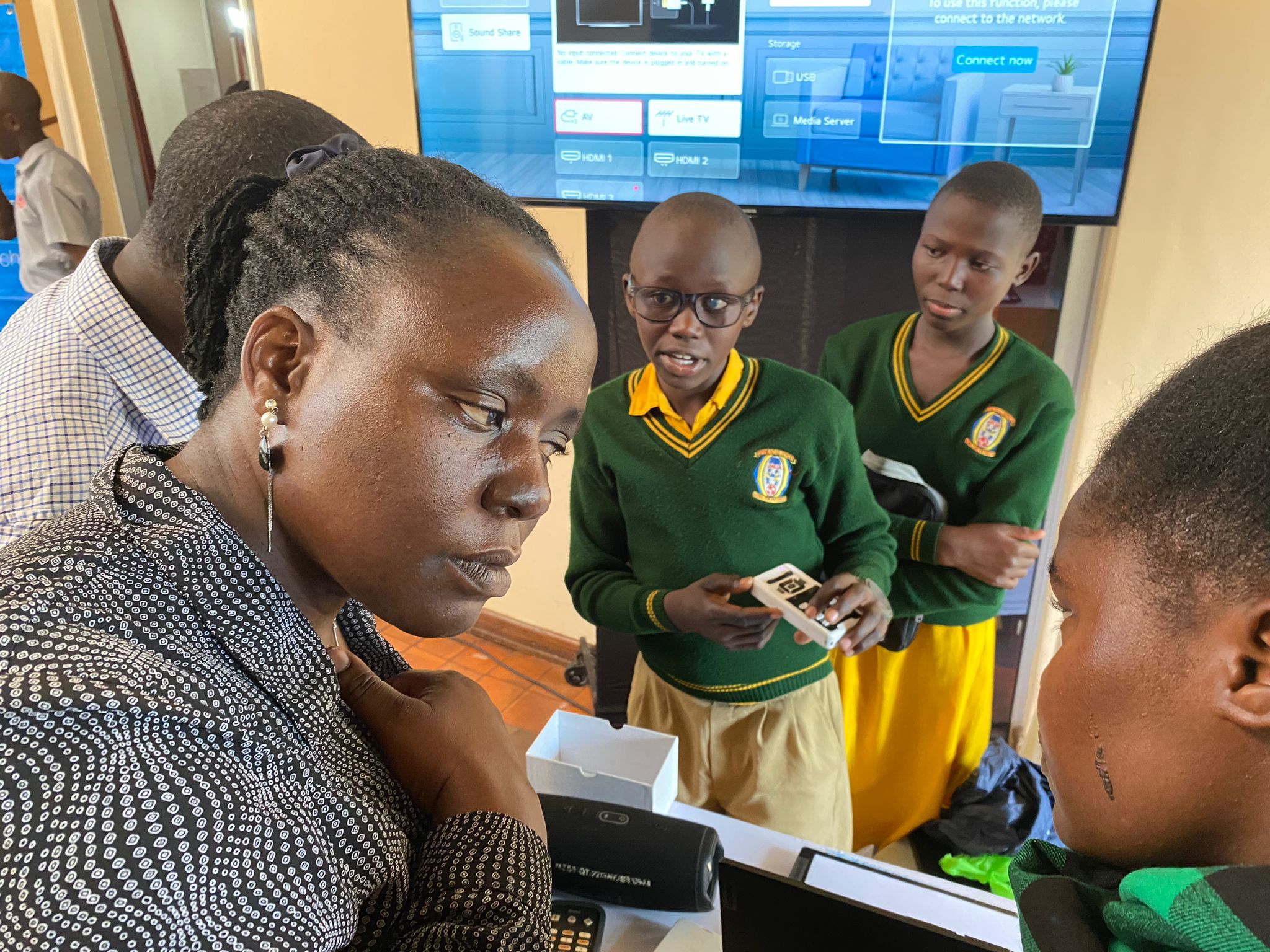 Students of Spire Primary School demonstrating the use of the internet and sound and visual gadgets that support students with visual and hearing impairments in classroom activities.