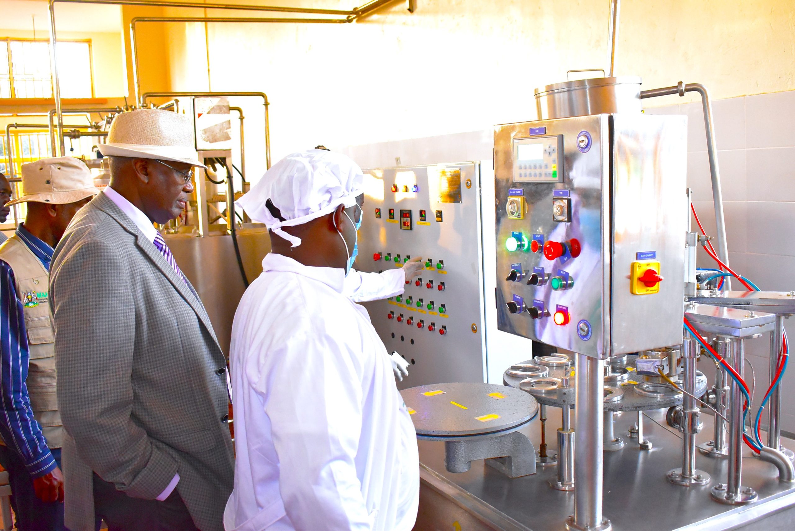 Minister Rwamirama is shown some of the plant components