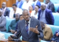 Jackson Kafuuzi, deputy Attorney General addresses Parliament during a plenary session on the new pension fund