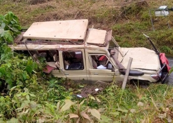 Wreckage of a Toyota Land Cruiser lies submerged in a river in western Uganda, after a fatal crash on January 27, 2025, that killed an American tourist and injured three others.