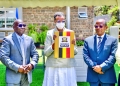 Education Minister Janet Museveni, flanked by State Minister for Higher Education John Chrysestom Muyingo and UNEB Chairperson Celetino Obua, releases the 2024 UCE results, marking a significant milestone in Uganda's education sector as the first cohort of students under the new curriculum receive their grades