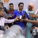 Minister for Gender, Labour and Social Development, Betty Amongi, addresses the media on the success of the GROW loan programme in empowering women entrepreneurs.