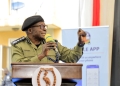 Inspector General of Police, Abas Byakagaba, addresses police officers on the importance of adopting a savings culture during a recent meeting.