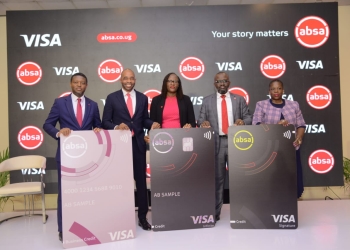 Executives from Absa Bank Uganda and Visa pose for a photo during the launch of the exclusive Visa Infinite, Signature, and Business Credit Cards in Kampala, Uganda