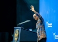 President Kagame connects with citizens during a Presidential Citizen Outreach event at BK Arena, where he addressed various concerns and issues.