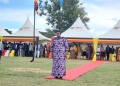 Vice President Alupo urges Ugandans to capitalize on peace and infrastructure for economic growth, advocating for a shift to commercial farming and highlighting government initiatives driving national development