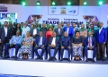 Business leaders from Uganda and Tanzania pose for a group photo during the trade mission in Kampala, showcasing the collaborative spirit of the event.