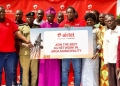 Chief guest- Bishop of the Diocese of Madi Nile – Rt. Rev Charles Collins Andaku(3rd L), Airtel Uganda’s Regional Business Manager West Nile, Martin Kawule(5th R) with other Airtel staff, community members and government officials having a photo moment at the commissioning of seven new network sites in Arua