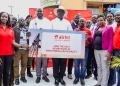 The District Chairperson of Kabarole, Mr. Richard Rwabuhinga(with white hat), Speaker of Fort Portal city, Albert Ahebwa(3rd L), Airtel Uganda’s Regional Business Manager, Mathias Busuulwa(3rd R), Head of Brand and Communication, Noela Byuma(L) with other Airtel staff and officials from Fort Portal city at the commissioning eight new Airtel network sites in Fort Portal City.