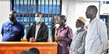 Ten individuals, including Kakooza Jasper and Hajju Kayongo Badru Ismail, appeared in Uganda's Anti-Corruption Court on Monday over alleged illegal land title creation.