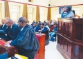 Inside Courtroom 3, a subdued atmosphere hung over the proceedings