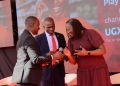 Absa Bank staff demonstrate the seamless process of digital payments, a key focus of their new card rewards campaign.