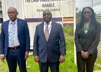 Kabale Resident Judge Karoli Lwanga Ssemogerere inspects the ongoing refurbishment of the historic Kabale Chief Magistrate's Court, established in 1937, emphasizing the importance of efficient case management and inter-court collaboration.