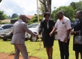 Deputy Chief Justice Dr. Flavian Zeija being welcomed by Acting Chief Registrar, Pamella Lamunu and Judiciary Public Relations Officer, Eremye Mawanda on Thursday.